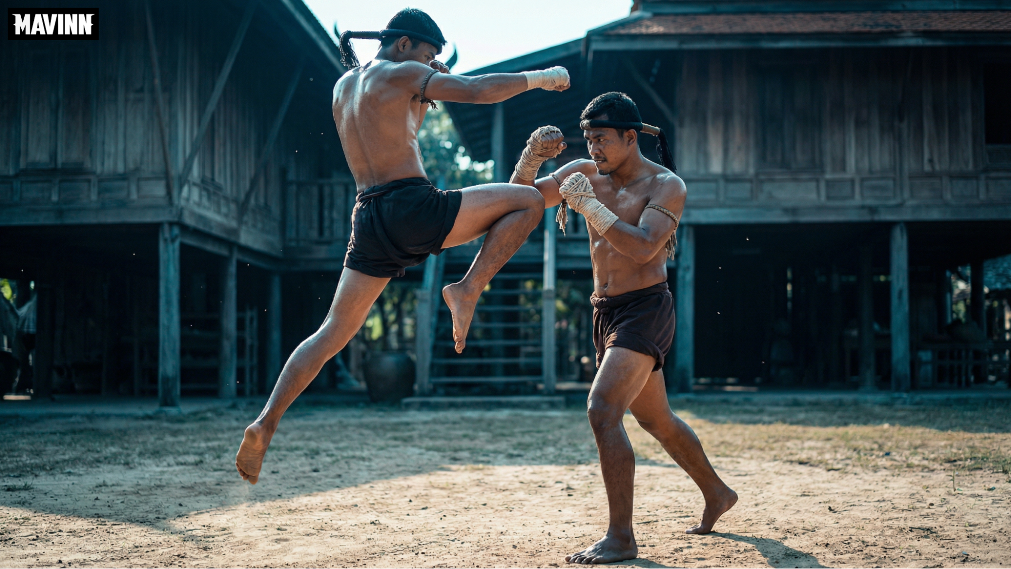 Traditional Muay Thai fighters demonstrating historic martial arts in Thailand